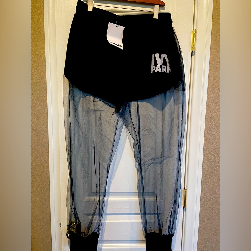Ivy Park NWT black mesh / sheer pants with built in shorts.